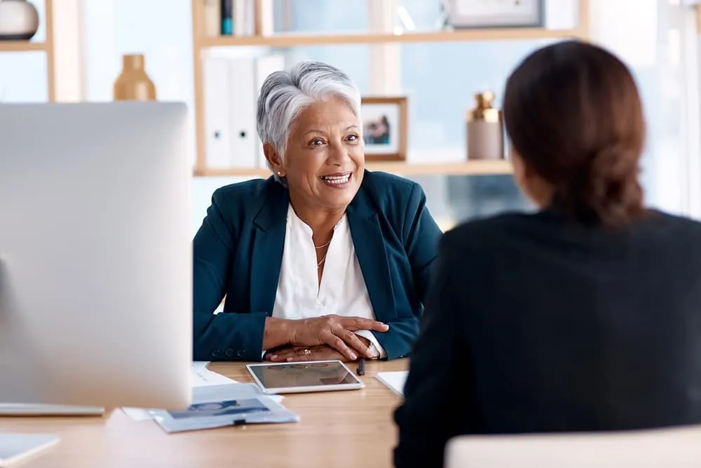 A leadership and finance team meeting