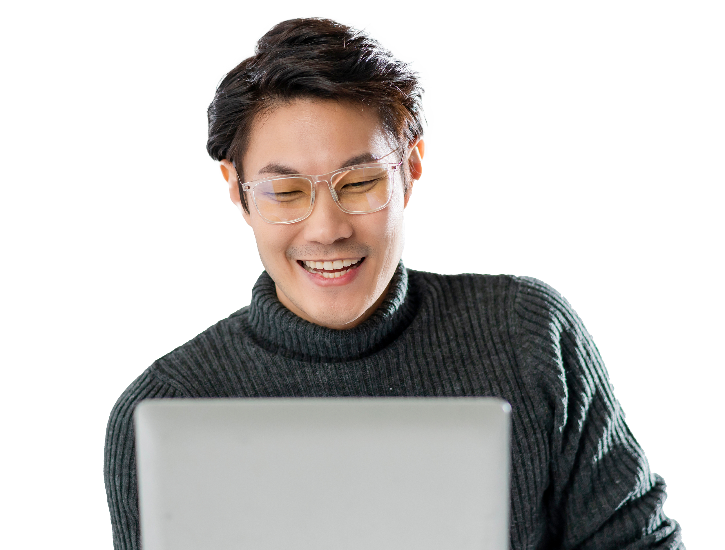 Man wearing glasses looking at laptop